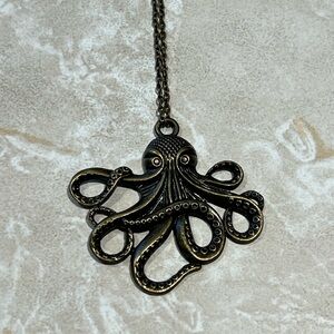 Antiqued gold tone octopus necklace 18”